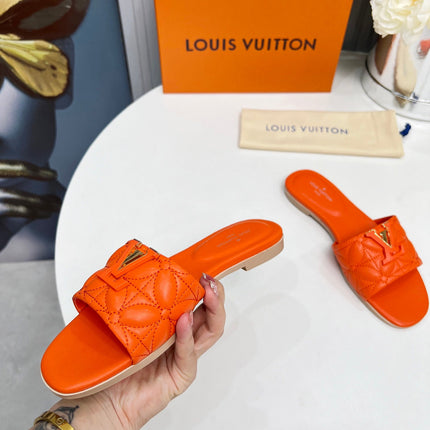 LV 26S MARE FLAT MULES IN ORANGE CALFSKIN