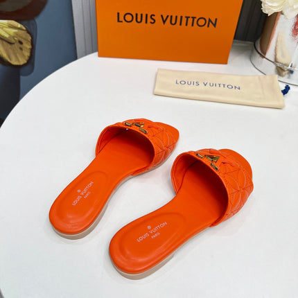 LV 26S MARE FLAT MULES IN ORANGE CALFSKIN