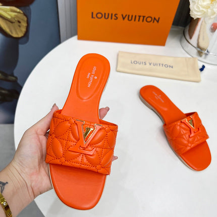LV 26S MARE FLAT MULES IN ORANGE CALFSKIN