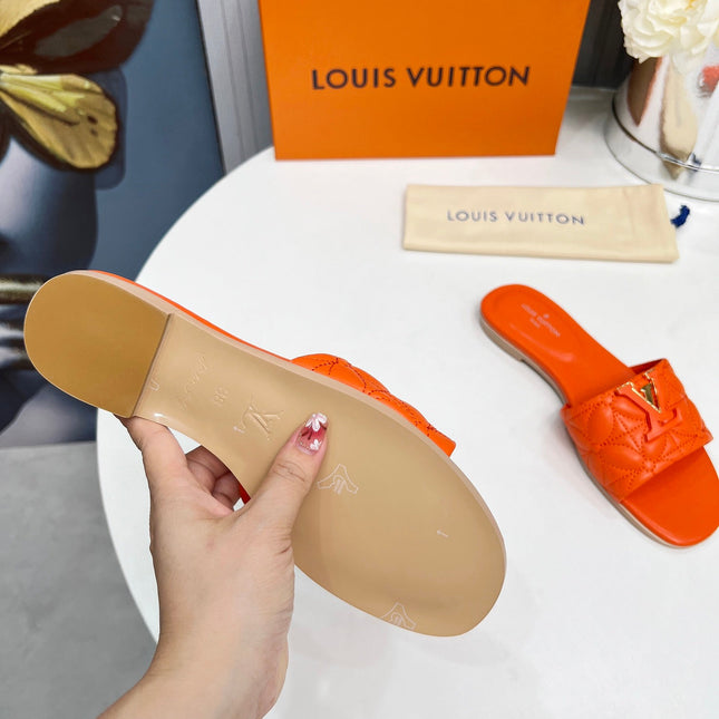LV 26S MARE FLAT MULES IN ORANGE CALFSKIN