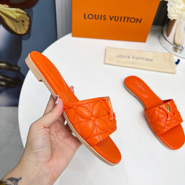 LV 26S MARE FLAT MULES IN ORANGE CALFSKIN