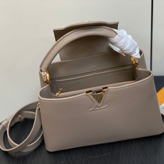 CAPUCINES MM 31 IN KHAKI BROWN TAURILLON