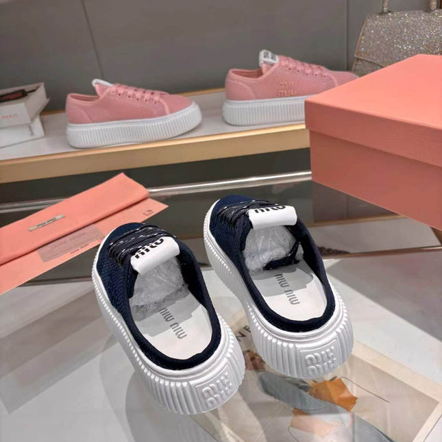 MIUMIU 26S SNEAKER MULES 45MM IN NAVY BLUE MESH