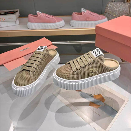 MIUMIU 26S SNEAKER MULES 45MM IN OLIVE GREEN MESH
