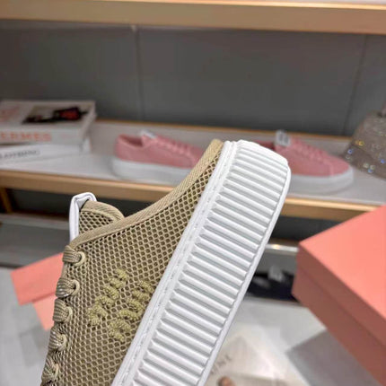 MIUMIU 26S SNEAKER MULES 45MM IN OLIVE GREEN MESH