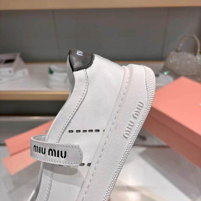 MIUMIU 26S MARY JANE BALLERINAS IN WHITE AND BLACK CALFSKIN