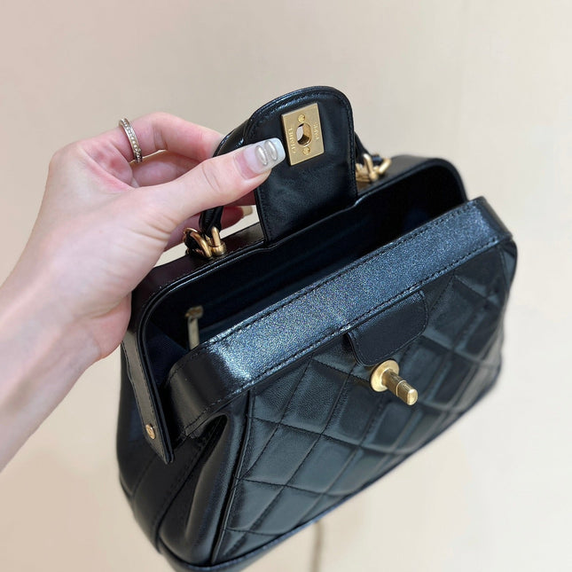 MEDIUM TOP HANDLE BAG 23 IN BLACK OIL-WAX LAMBSKIN GOLD HARDWARE
