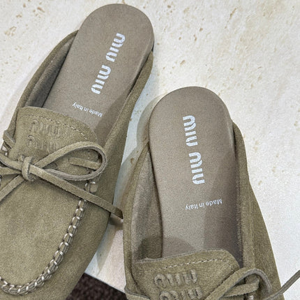 MIUMIU 26S SNEAKER MULES IN DARK OLIVE GREEN SUEDE WITH BOW