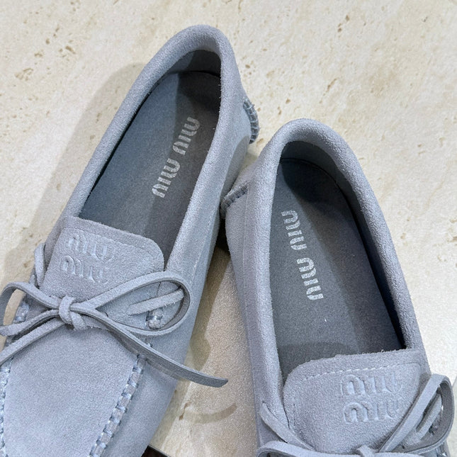 MIUMIU 26S LOAFERS IN LIGHT BLUE SUEDE WITH BOW