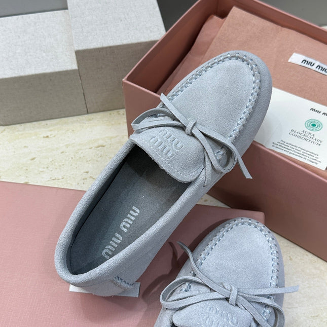 MIUMIU 26S LOAFERS IN LIGHT BLUE SUEDE WITH BOW