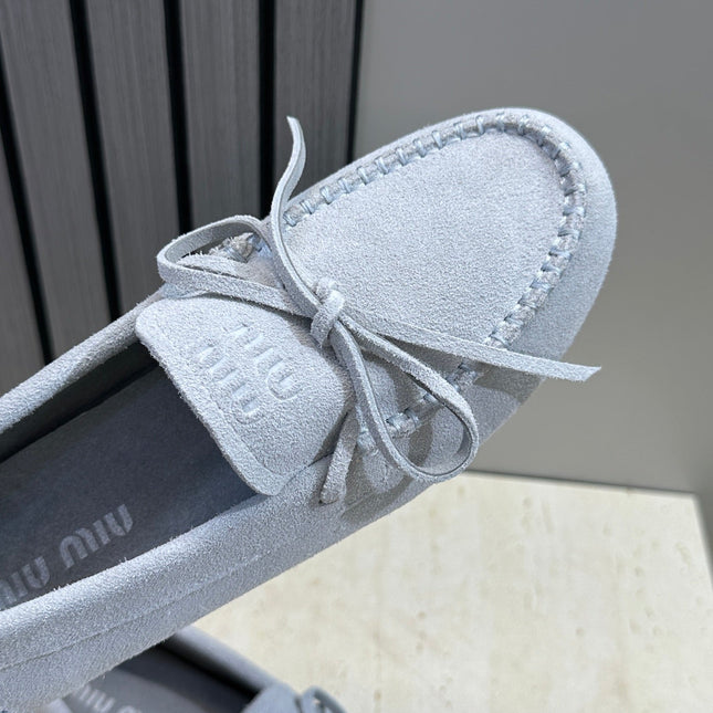 MIUMIU 26S LOAFERS IN LIGHT BLUE SUEDE WITH BOW