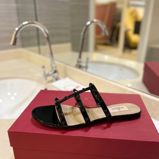 VALENTINO 26S ROCKSTUD CAGED SANDALS IN BLACK PATENT CALFSKIN