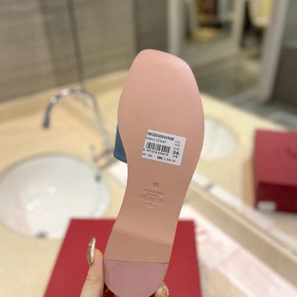 VALENTINO 26S SLIDES IN PASTEL BLUE CALFSKIN WITH LOGO