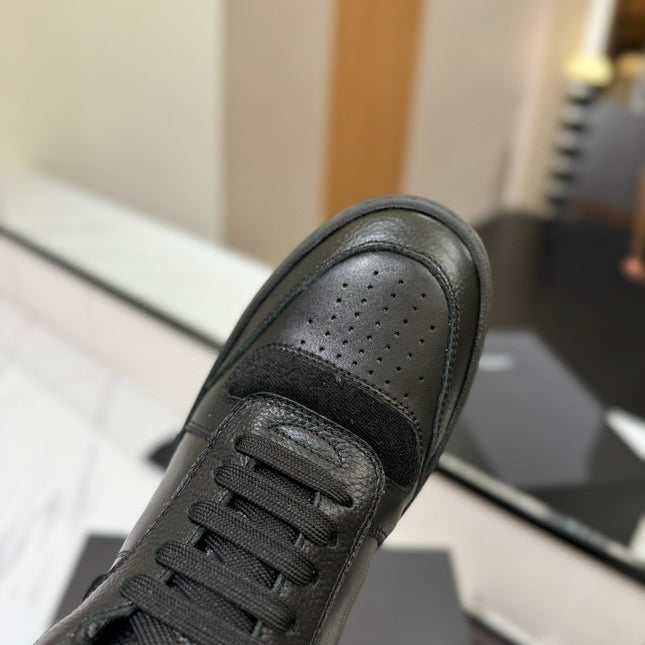 MID-TOP SNEAKERS IN BLACK PERFORATED LAMBSKIN