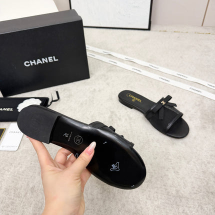 CHANEL 26S SLIDE SANDALS IN BLACK MESH AND CALFSKIN WITH RIBBON