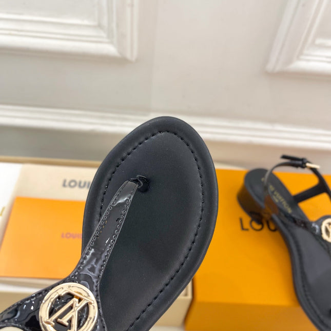LV SUNKISS T-STRAP SANDALS IN BLACK CALFSKIN GOLD-TONE ACCESSORY.