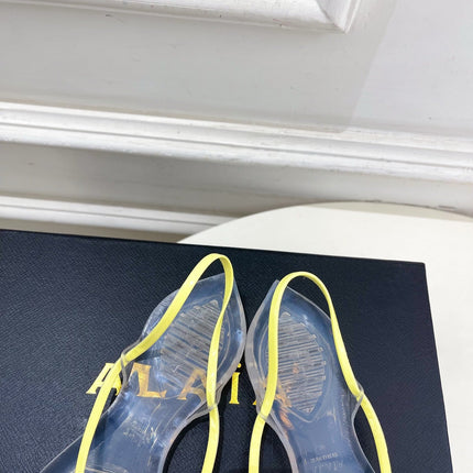 ALAIA 26S POINTED-TOE THONG SANDALS IN YELLOW AND TRANSPARENT PVC