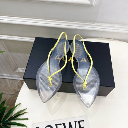 ALAIA 26S POINTED-TOE THONG SANDALS IN YELLOW AND TRANSPARENT PVC