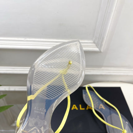 ALAIA 26S POINTED-TOE THONG SANDALS IN YELLOW AND TRANSPARENT PVC