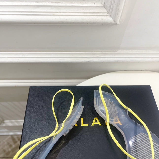 ALAIA 26S POINTED-TOE THONG SANDALS IN YELLOW AND TRANSPARENT PVC