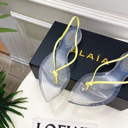ALAIA 26S POINTED-TOE THONG SANDALS IN YELLOW AND TRANSPARENT PVC