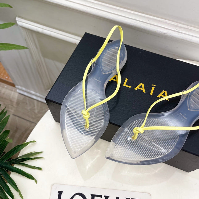 ALAIA 26S POINTED-TOE THONG SANDALS IN YELLOW AND TRANSPARENT PVC