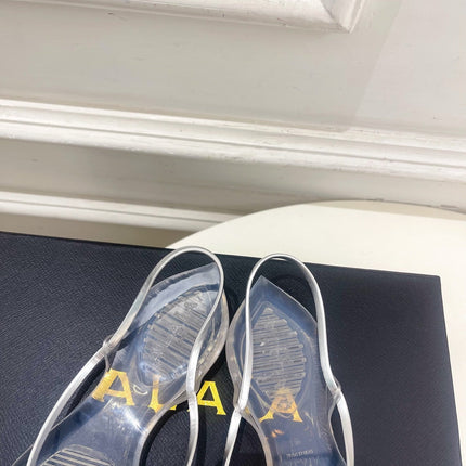 ALAIA 26S POINTED-TOE THONG SANDALS IN SILVER AND TRANSPARENT PVC