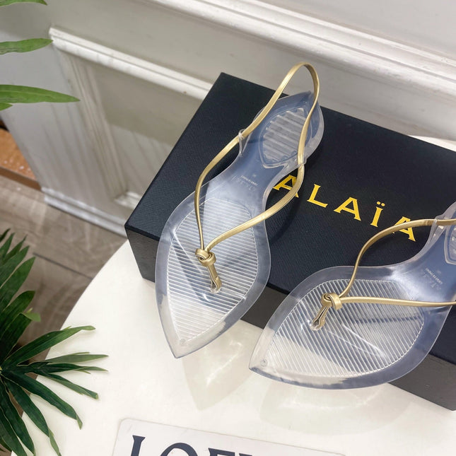 ALAIA 26S POINTED-TOE THONG SANDALS IN GOLD AND TRANSPARENT PVC
