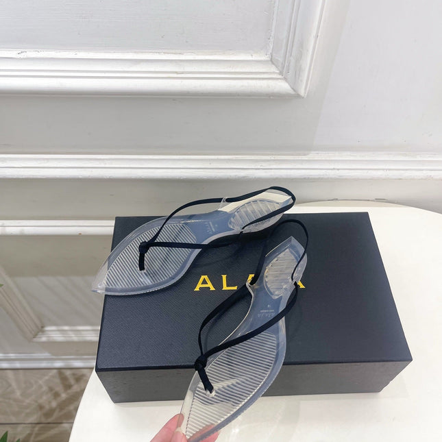 ALAIA 26S POINTED-TOE THONG SANDALS IN BLACK SATIN AND TRANSPARENT PVC