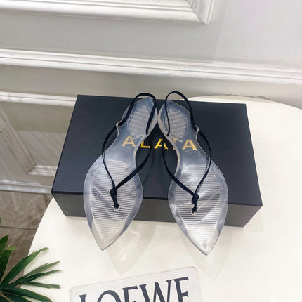 ALAIA 26S POINTED-TOE THONG SANDALS IN BLACK SATIN AND TRANSPARENT PVC