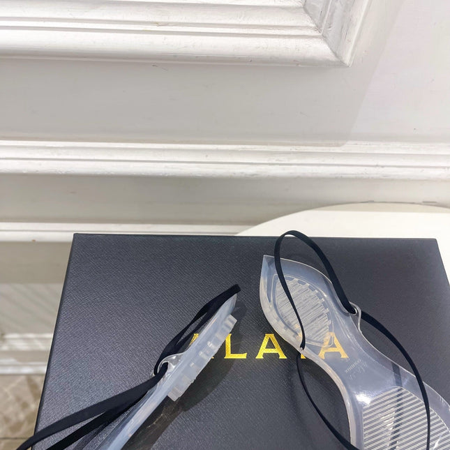 ALAIA 26S POINTED-TOE THONG SANDALS IN BLACK SATIN AND TRANSPARENT PVC