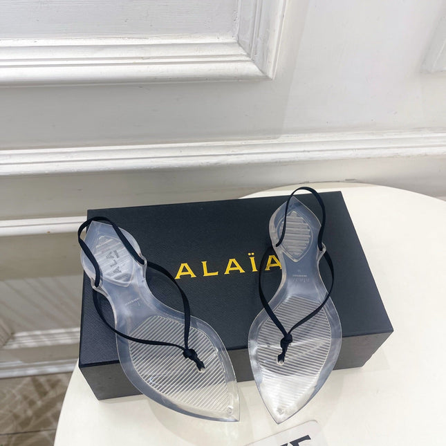 ALAIA 26S POINTED-TOE THONG SANDALS IN BLACK SATIN AND TRANSPARENT PVC