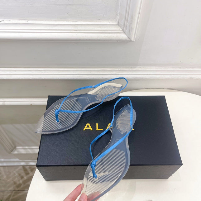 ALAIA 26S POINTED-TOE THONG SANDALS IN BLUE SATIN AND TRANSPARENT PVC