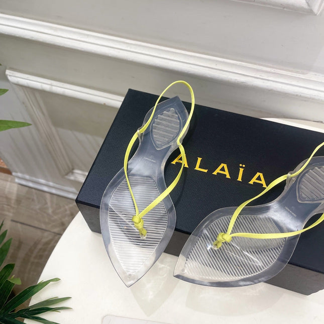 ALAIA 26S POINTED-TOE THONG SANDALS IN LIGHT YELLOW SATIN AND TRANSPARENT PVC