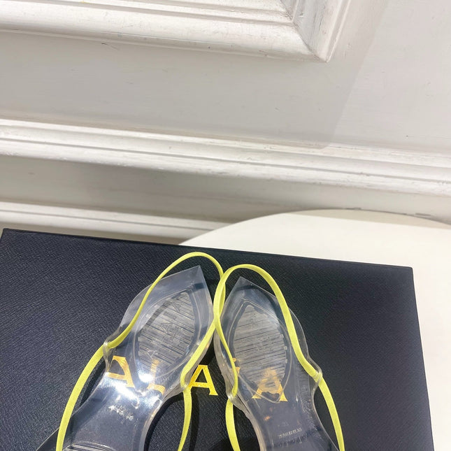ALAIA 26S POINTED-TOE THONG SANDALS IN LIGHT YELLOW SATIN AND TRANSPARENT PVC