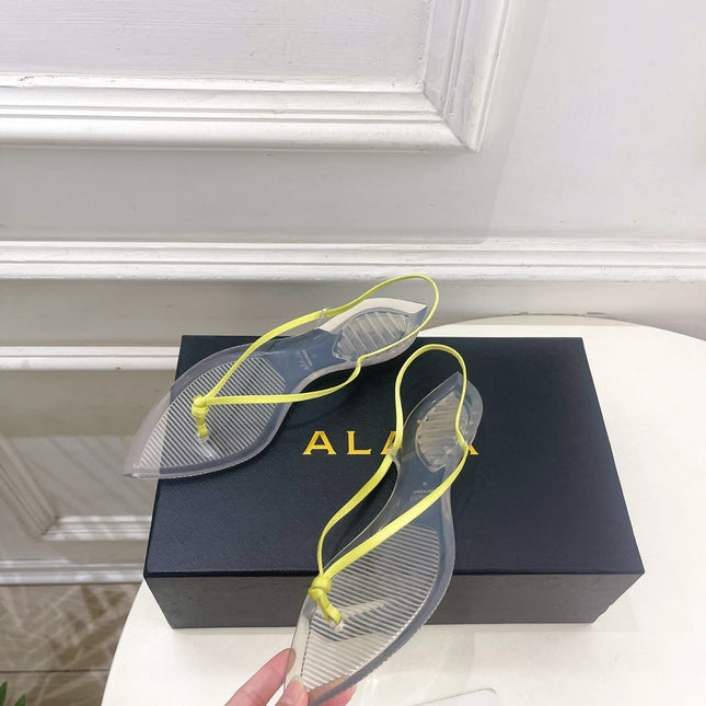 ALAIA 26S POINTED-TOE THONG SANDALS IN LIGHT YELLOW SATIN AND TRANSPARENT PVC