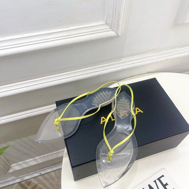 ALAIA 26S POINTED-TOE THONG SANDALS IN LIGHT YELLOW SATIN AND TRANSPARENT PVC