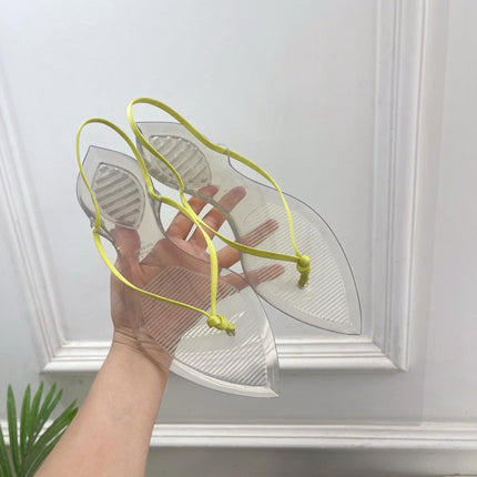 ALAIA 26S POINTED-TOE THONG SANDALS IN LIGHT YELLOW SATIN AND TRANSPARENT PVC