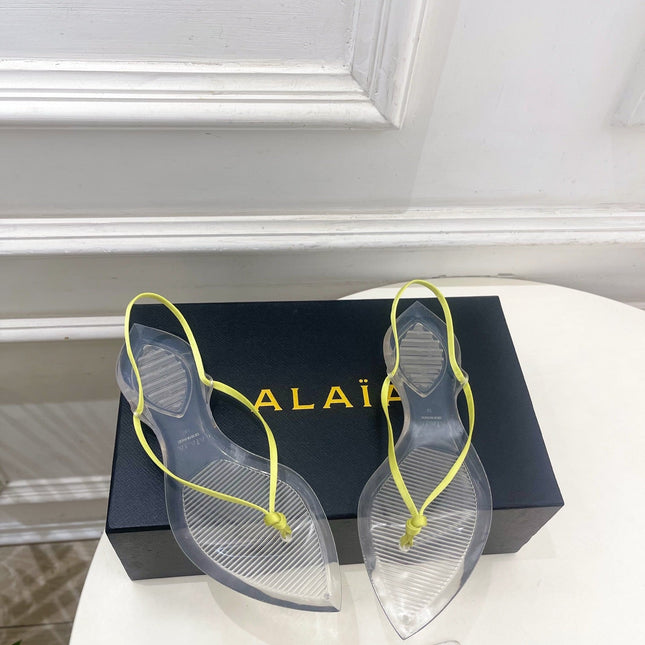 ALAIA 26S POINTED-TOE THONG SANDALS IN LIGHT YELLOW SATIN AND TRANSPARENT PVC