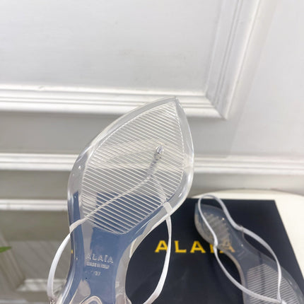 ALAIA 26S POINTED-TOE THONG SANDALS IN WHITE SATIN AND TRANSPARENT PVC
