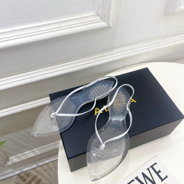 ALAIA 26S POINTED-TOE THONG SANDALS IN WHITE SATIN AND TRANSPARENT PVC