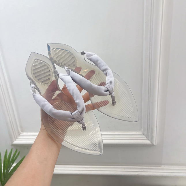 ALAIA 26S THONG SANDALS IN PEARL GREY SATIN AND TRANSPARENT PVC