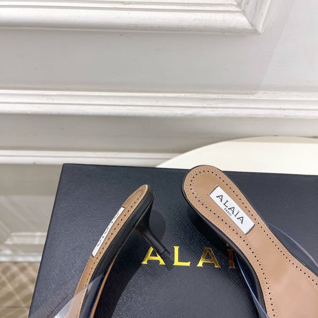 ALAIA 26S MULE HEELS 55 MM IN BLACK LAMBSKIN AND TRANSPARENT PVC