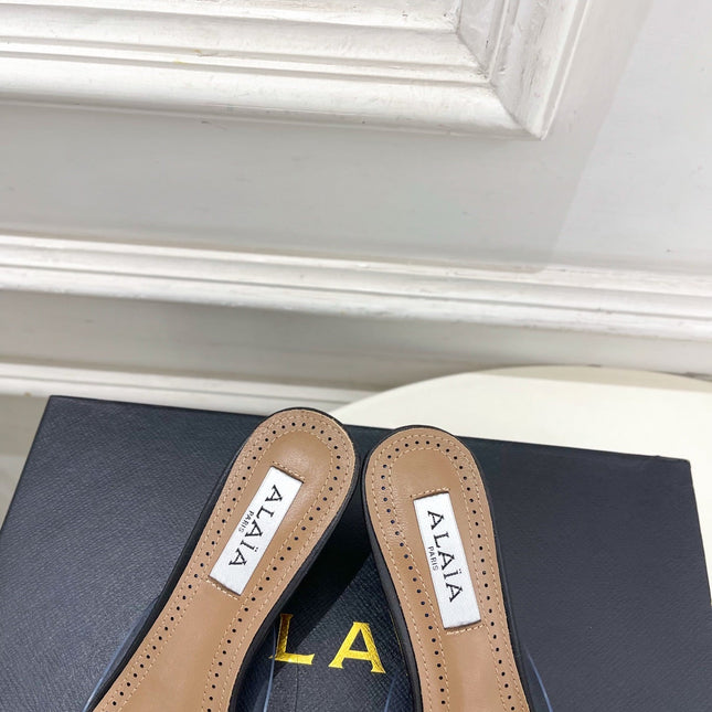 ALAIA 26S MULE HEELS 55 MM IN BLACK LAMBSKIN AND TRANSPARENT PVC