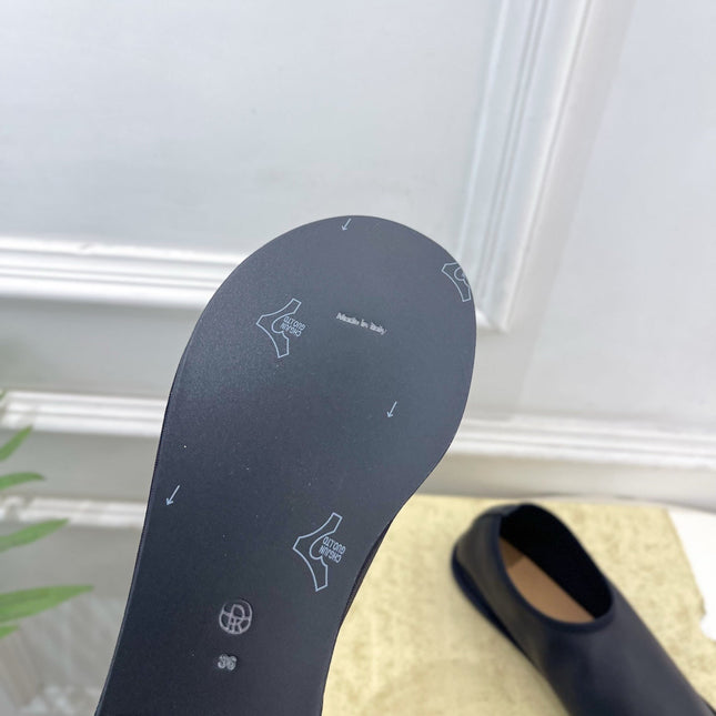 THE ROW 26S SLIP-ON FLATS IN BLACK NAPPA CALFSKIN