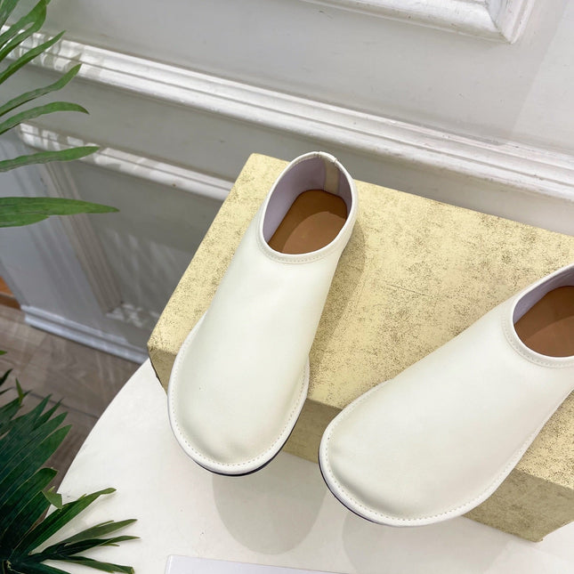 THE ROW 26S SLIP-ON FLATS IN WHITE NAPPA CALFSKIN