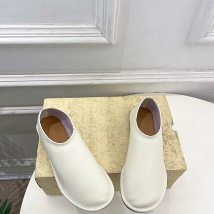 THE ROW 26S SLIP-ON FLATS IN WHITE NAPPA CALFSKIN