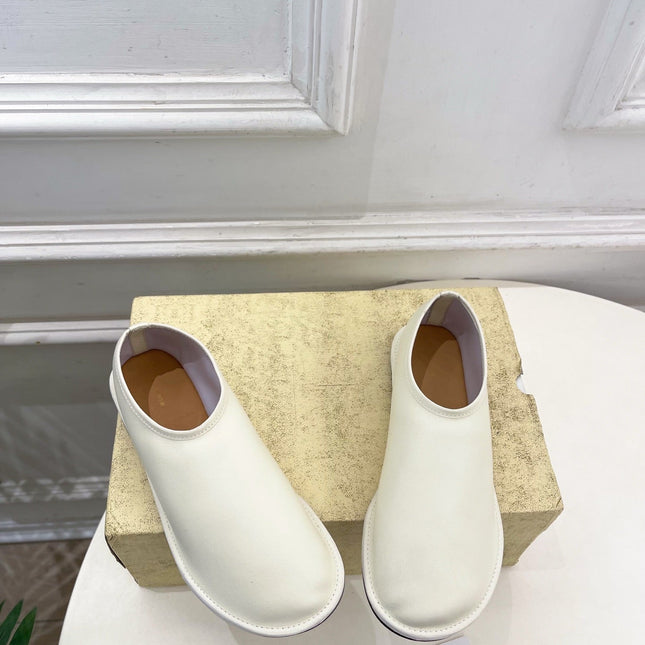 THE ROW 26S SLIP-ON FLATS IN WHITE NAPPA CALFSKIN
