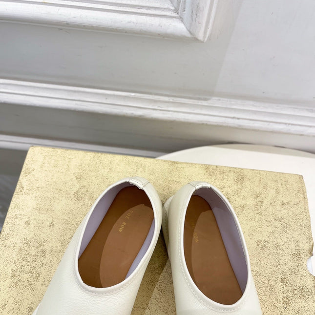 THE ROW 26S SLIP-ON FLATS IN WHITE NAPPA CALFSKIN