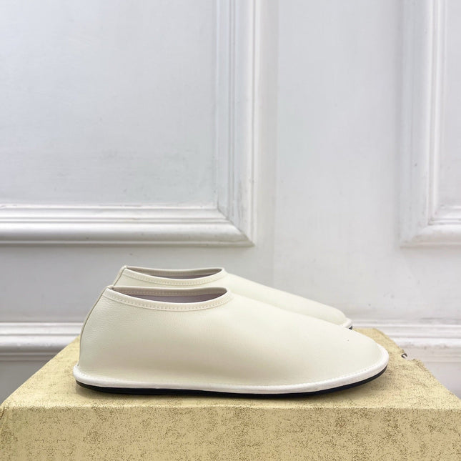THE ROW 26S SLIP-ON FLATS IN WHITE NAPPA CALFSKIN